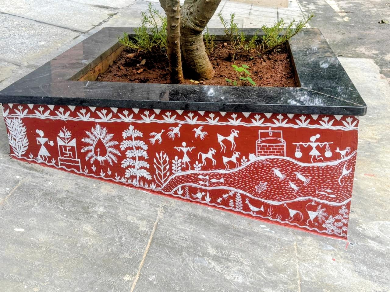 Hand-painted Warli folk art detail