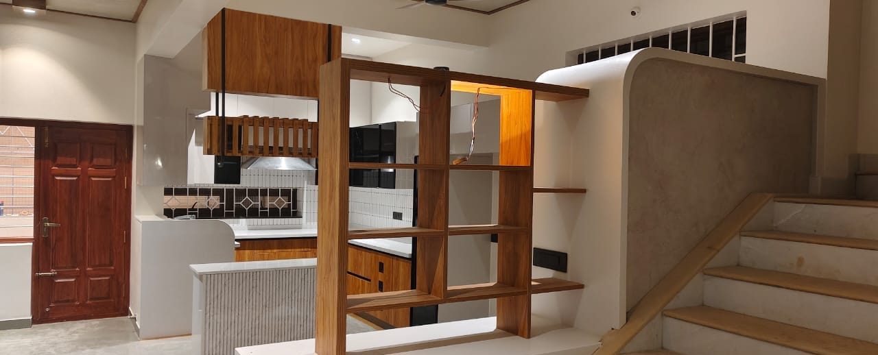Timber partition beside the stair, by Padmodya Interiors