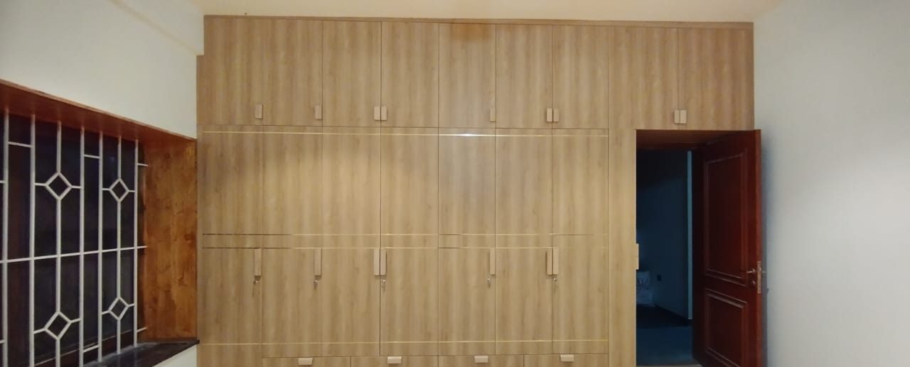 Full-height oak wardrobe, by Padmodya Interiors
