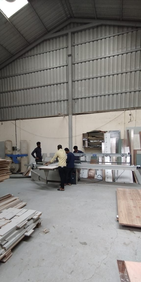 The production team assembling a unit in the workshop